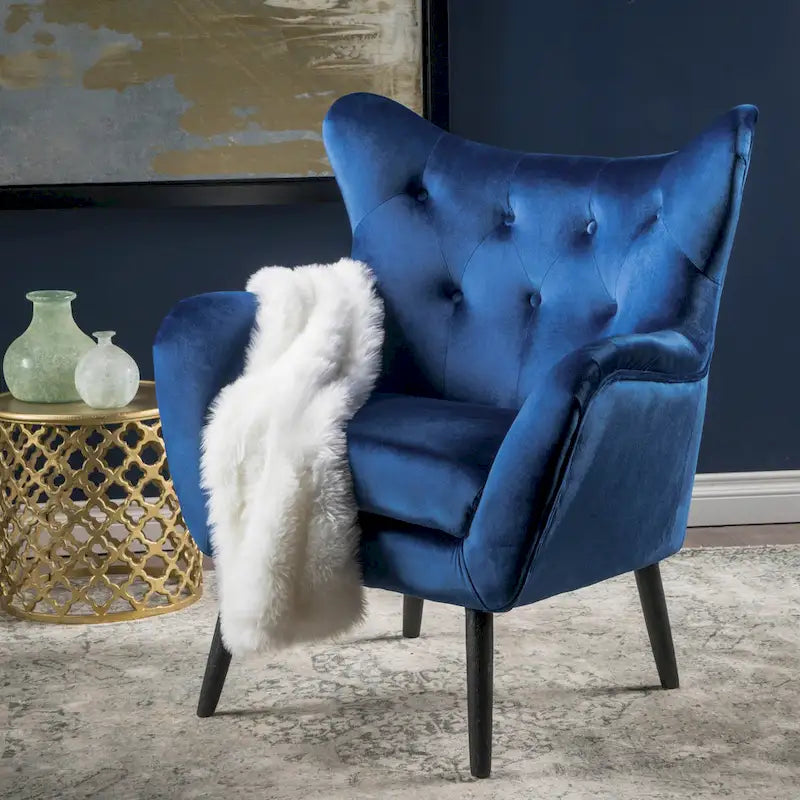 Poltrona Wingback monoposto in velluto blu navy
