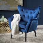 Poltrona Wingback monoposto in velluto blu navy