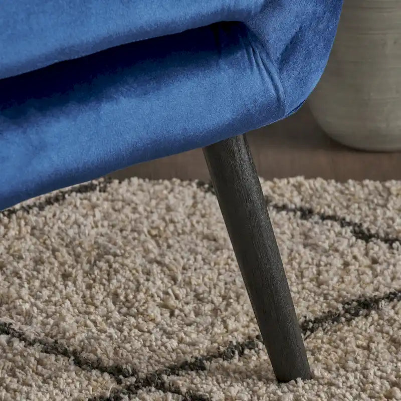 Poltrona Wingback monoposto in velluto blu navy