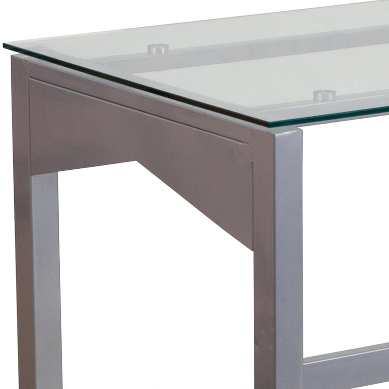 Scrivania da computer monoposto con ripiano in vetro trasparente, struttura geometrica argentata